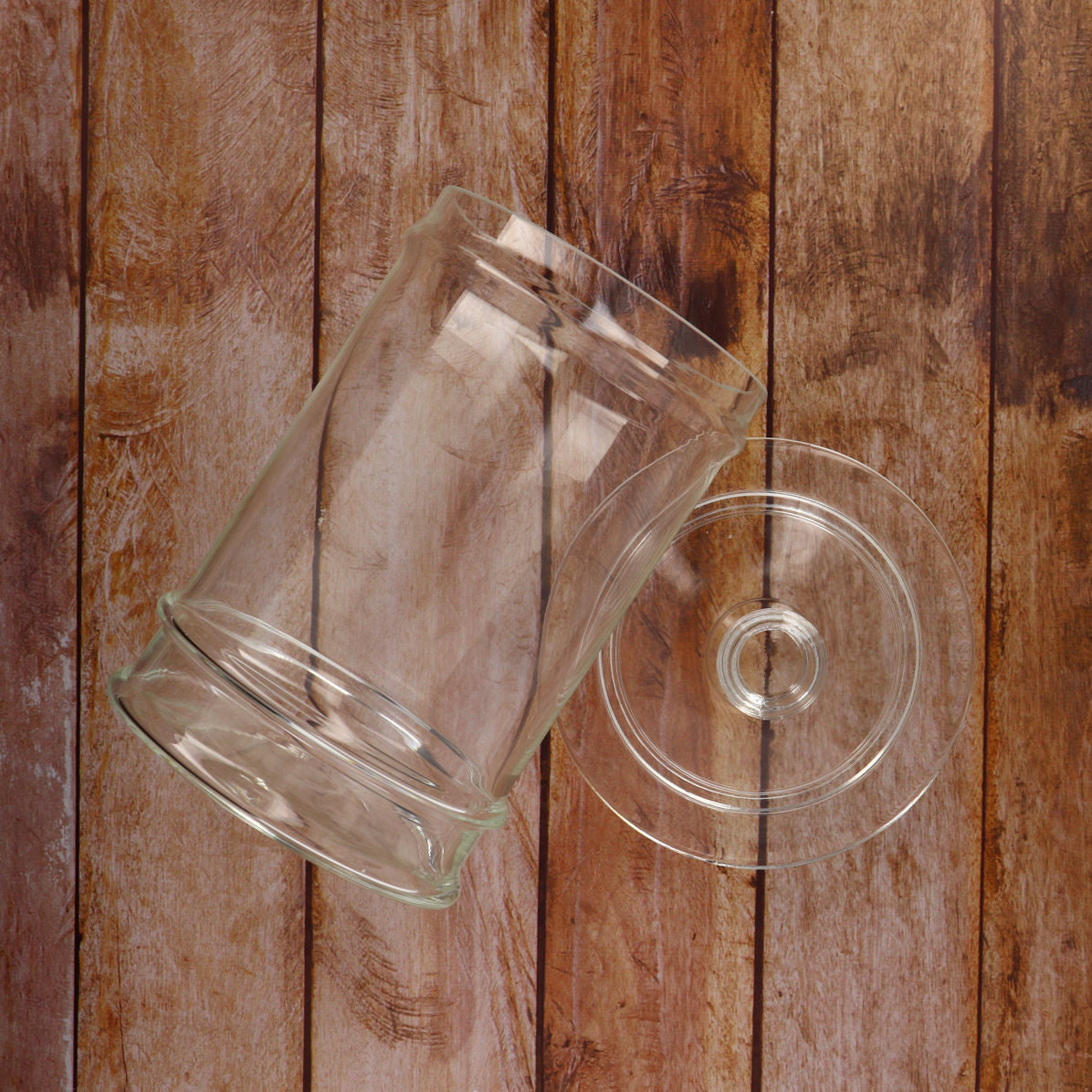 La Rochere Jar with its Lead on Wood Table
