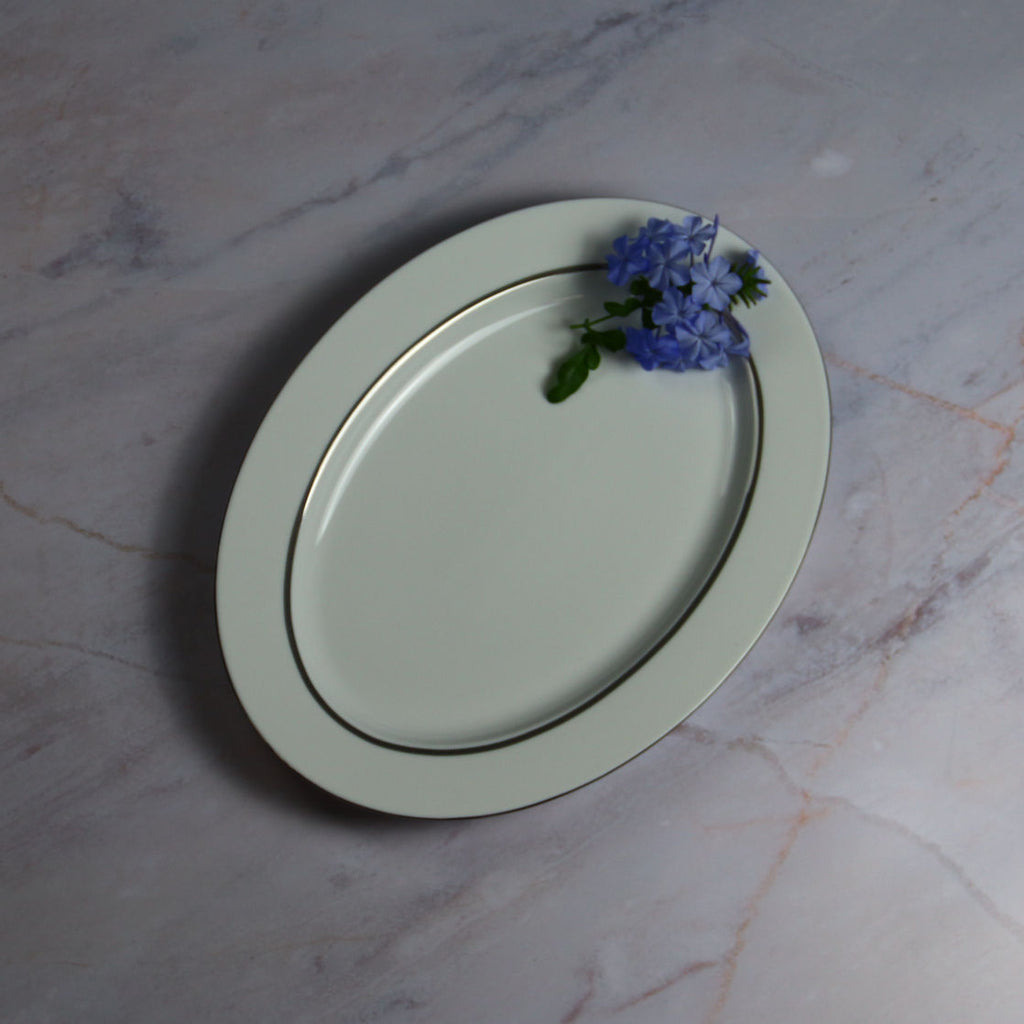 Degrenne Oval dish on Marble with Blue Flower Topshot