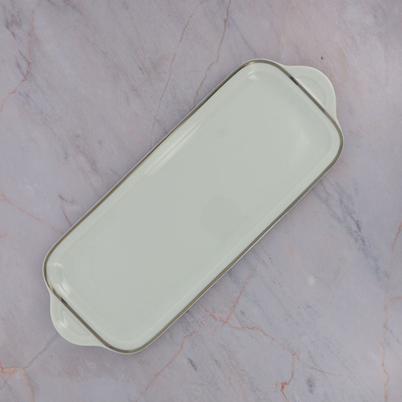 Empty Degrenne cake dish on Marble