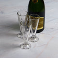 La Rochere champain Flutes Abeille and a bottle of champagne