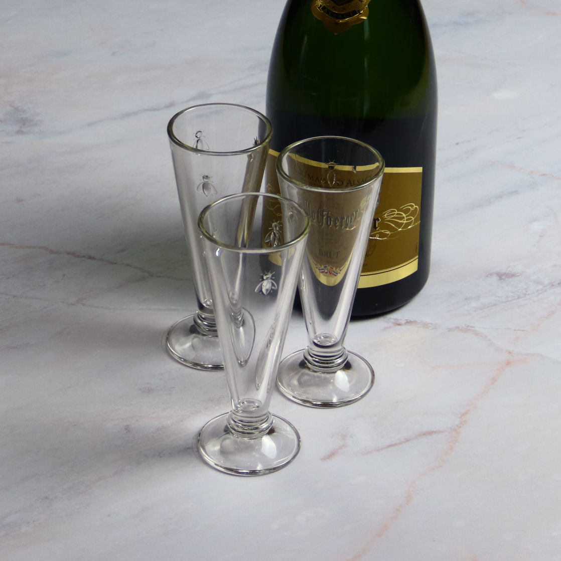 La Rochere champain Flutes Abeille and a bottle of champagne