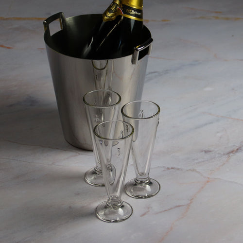 La Rochere champain Flutes Abeille and a bottle of champagne in its bucket