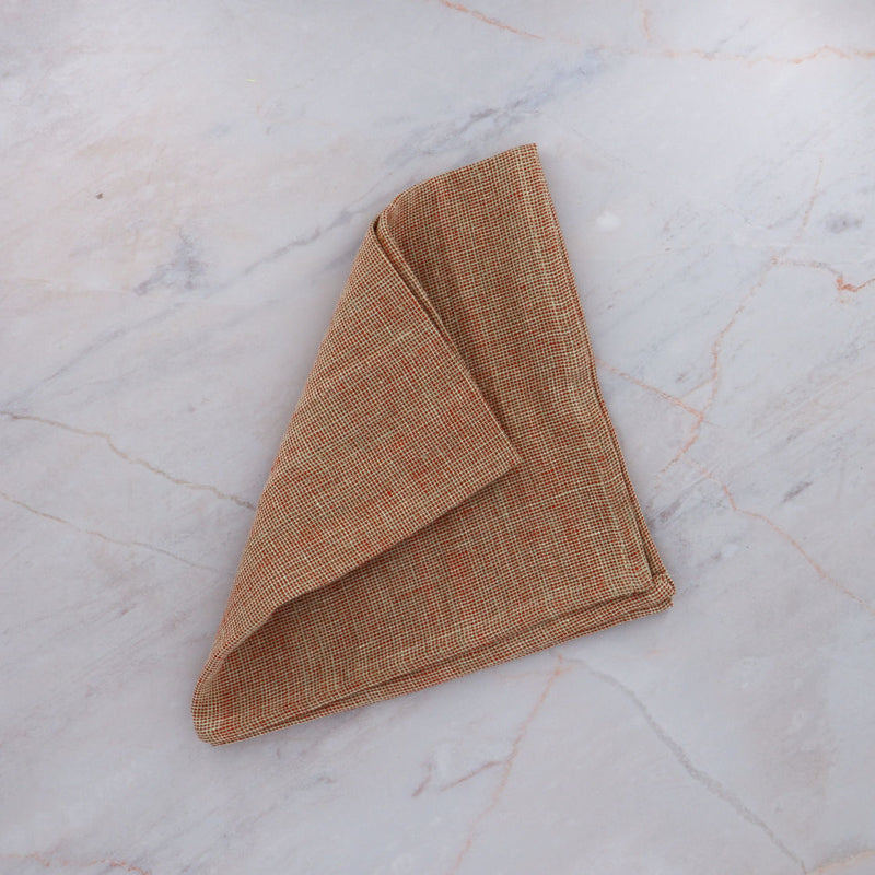 Charvet Edition Folded Napkins MODENA Red Linen on Marble